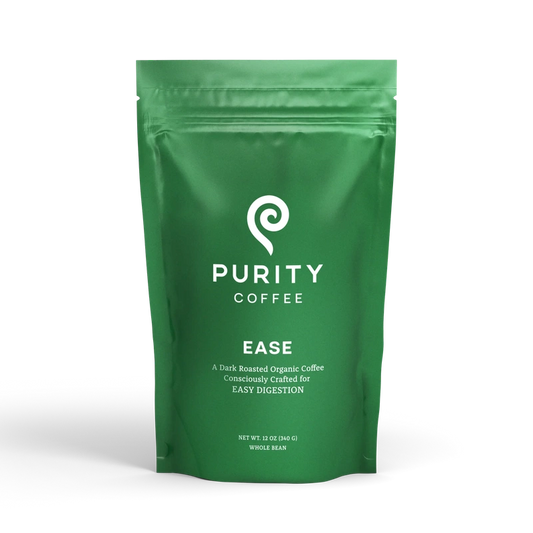 Green bag of Purity Coffee Ease, dark roasted organic whole bean coffee, 12 oz, crafted for easy digestion, available at Peak Health Shop.